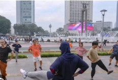 Olahraga & Polusi Jakarta: Strategi Pilih Waktu Lari Pagi yang Aman di Kawasan Sudirman Sesuai Data Udara 2026